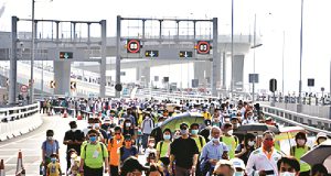 Thousands join Walk for Millions on Iconic HZMB Bridge to Commemorate The Community Chest’s 55th Anniversary 11,000 people join Walk for Millions on mega bridge_upscayl_4x