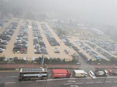 Hong Kong Battles Floods and Landslides as Heavy Rains Pound Region Cars damaged by flood in Hong Kong