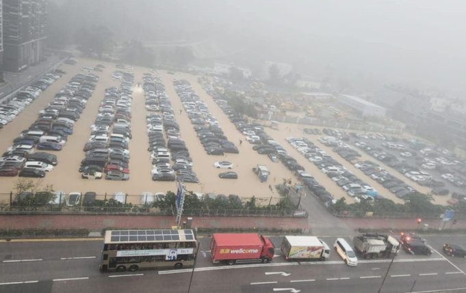 Hong Kong Battles Floods and Landslides as Heavy Rains Pound Region Cars damaged by flood in Hong Kong