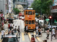 Filipino Woman Struck by Taxi After ignoring traffic lights in Wan Chai Hong Kong pedestrian crossing unsplash v2