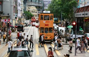 Filipino Woman Struck by Taxi After ignoring traffic lights in Wan Chai Hong Kong pedestrian crossing unsplash v2