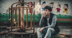 Hong Kong Unveils Ambitious Tobacco Control Policies to Create ‘Tobacco-Free Hong Kong’ photo-of-a-young-man-in-his-20-smoking v5