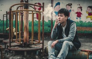 Hong Kong Unveils Ambitious Tobacco Control Policies to Create ‘Tobacco-Free Hong Kong’ photo-of-a-young-man-in-his-20-smoking v5