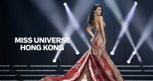 Hong Kong Miss Universe Pageant Lifts Age Limit, Offers HK$1 Million Prize A beautiful woman wearing evening gown with back turn to the camera, stage light, Miss Universe Hong Kong