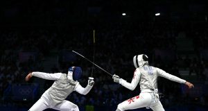 Hong Kong Celebrates as Cheung Ka-long Bags Another Gold in Fencing, Haughey Wins Bronze Cheung Ka-long, from Hong Kong, China, won the gold medal v3