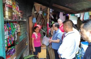 China Embassy, group donate relief goods to typhoon victims in Manila Chinese Ambassador Huang Xilian leads the relief drive for Typhoon Carina victims