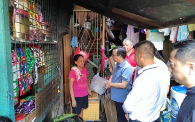 China Embassy, group donate relief goods to typhoon victims in Manila Chinese Ambassador Huang Xilian leads the relief drive for Typhoon Carina victims