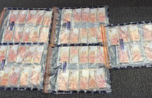 Hong Kong Police Arrest Three in Counterfeiting Sting Ploce photo counterfeit money