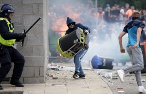 Hong Kong Government Urges Caution for Travelers to the UK Amid Protests UK riots explained
