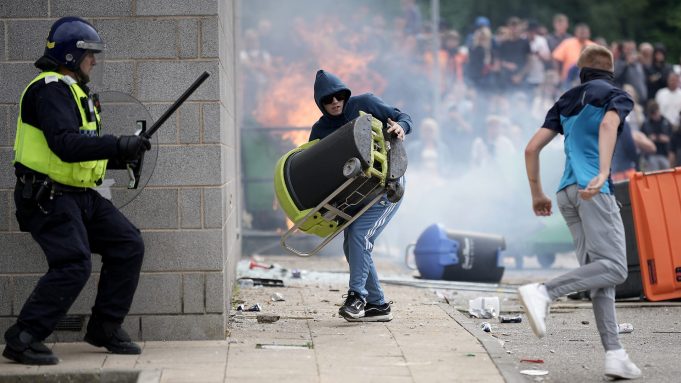 Hong Kong Government Urges Caution for Travelers to the UK Amid Protests UK riots explained