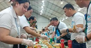 Filipino Seafarers Honored as Philippines Celebrates World Maritime Week Filipino seafarers partake in a boodle fight prepared by the Department of Migrant Workers