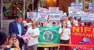 Migrant Workers in Hong Kong Rally for Living Wage, Challenge Consulates to Act Photo in Phil. Consulate