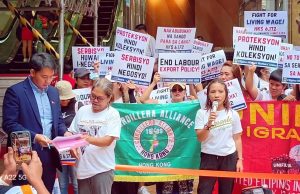 Migrant Workers in Hong Kong Rally for Living Wage, Challenge Consulates to Act Photo in Phil. Consulate