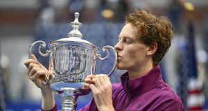Sinner Sweeps to Second Grand Slam Title at US Open Sinner with the trophy after claiming his first US Open men's singles title, Photo AFP