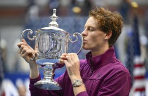 Sinner Sweeps to Second Grand Slam Title at US Open Sinner with the trophy after claiming his first US Open men's singles title, Photo AFP