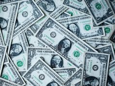 Overseas Filipino Workers Boost Remittances Amid Global Economic Uncertainty US dollar bills unsplash