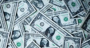 Overseas Filipino Workers Boost Remittances Amid Global Economic Uncertainty US dollar bills unsplash