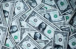 Overseas Filipino Workers Boost Remittances Amid Global Economic Uncertainty US dollar bills unsplash