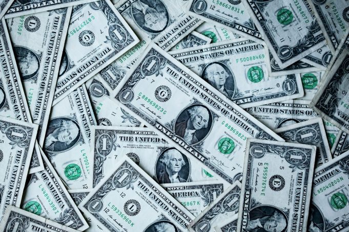 Overseas Filipino Workers Boost Remittances Amid Global Economic Uncertainty US dollar bills unsplash