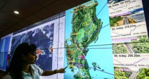 Series of Powerful Storms Displace Over 85,000 Families Across the Philippines A weather specialist monitors potential tropical cyclones