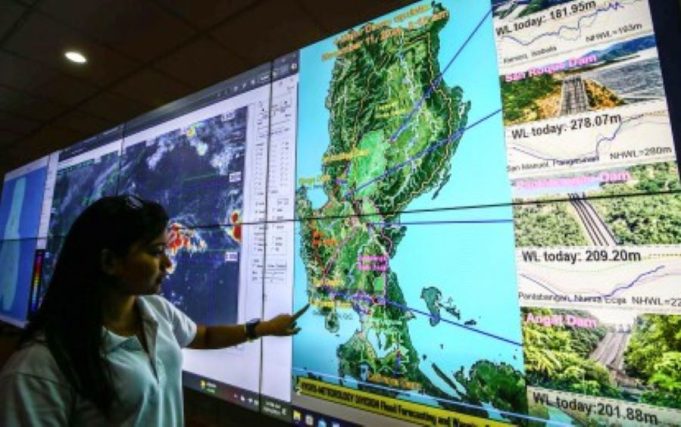 Series of Powerful Storms Displace Over 85,000 Families Across the Philippines A weather specialist monitors potential tropical cyclones