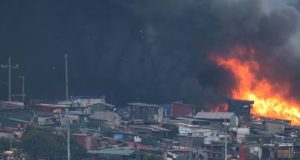 Massive Blaze Destroys Hundreds of Homes in Manila Slum Fire rips through slum area in Philippine capital