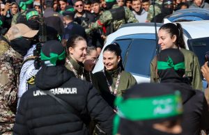 Hostage-Prisoner Swap Unfolds Amidst Gaza Ceasefire Hamas fighters escort four Israeli hostages