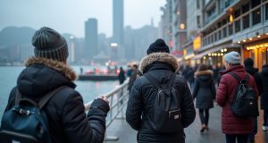 Hong Kong Braces For Winter Chill, Flu Experts Warn Of Potential Outbreak hong_kong_people_wearing_thick_cold_weather_clothing_victoria_harbor_scene