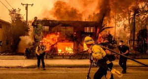 Los Angeles Wildfires Devastate Coastal Communities, Claim Five Lives rampaging wildfires around Los Angeles