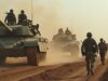 Global Military Spending Hits $2.7 Trillion in 2024, Driven by Conflicts and Geopolitical Tensions soldiers_in_battle_with_tankls_and_armored_personnel_carrier
