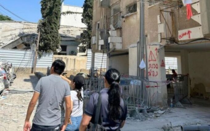 Filipinos Flee Conflict: First Evacuees Cross Israel-Jordan Border to Safety A residential building in Bnei Brak City, Israel destroyed by Iranian missile attacks