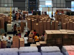 PH Government Readies Aid Preparation As Phivolcs Warns of Possible Taal Eruption DSWD Volunteers help repack family food packs