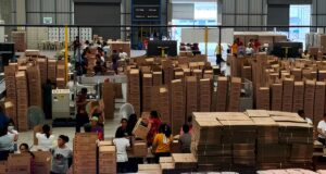 PH Government Readies Aid Preparation As Phivolcs Warns of Possible Taal Eruption DSWD Volunteers help repack family food packs