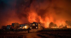 Wildfires Ravage Spanish Villages as Heatwave Grips Europe A Spanish village on fire