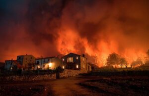 Wildfires Ravage Spanish Villages as Heatwave Grips Europe A Spanish village on fire