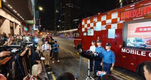 2 Remain in Critical Condition After 3-Alarm Blaze Engulfs Hong Kong Office Building Central Chinachem Tower fire
