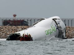 Two Killed in Hong Kong Airport Crash After Cargo Plane Veers Off Runway Two Killed in Hong Kong Airport Crash After Cargo Plane Veers Off Runway