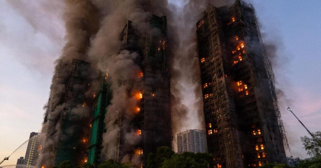 13 Dead, Including Firefighter, as Hong Kong Housing Blaze Escalates to Maximum Alert