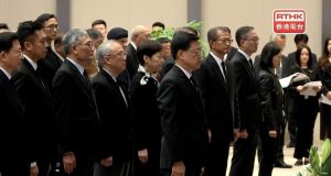 John Lee Heads Solemn Tribute to Victims of Nanjing Massacre Chief Executive John Lee and participants take part in the ceremony