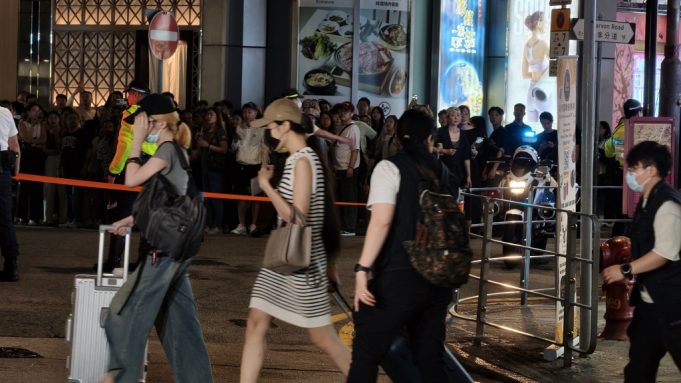 HK police, Immigration Department dismantle suspected prostitution network in TST building Illegal work raid 002