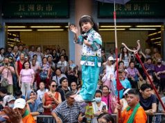 Cheung Chau Bun Festival draws crowds with colorful parade, rising bun prices Cheung Chau Bun Festival draws crowds with colorful parade