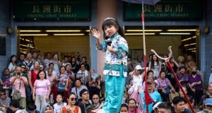 Cheung Chau Bun Festival draws crowds with colorful parade, rising bun prices Cheung Chau Bun Festival draws crowds with colorful parade