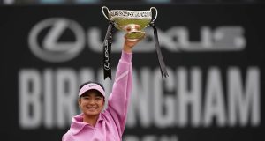 Eala Captures Birmingham Classic Title, Joins Pantheon of Champions Alex Eala holding the trophy at the Birmingham Classic